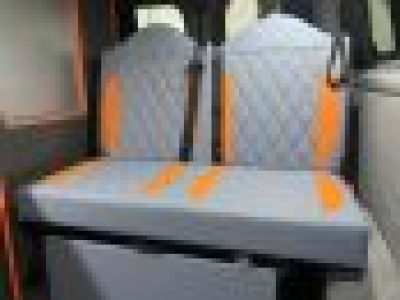 orange and grey upholstered rock-and-roll-beds